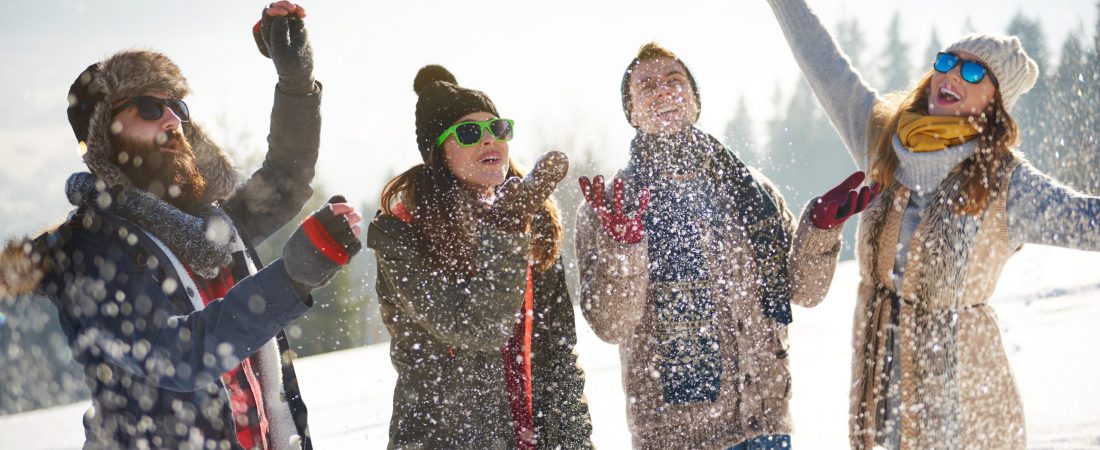 Friends covered with fresh snow